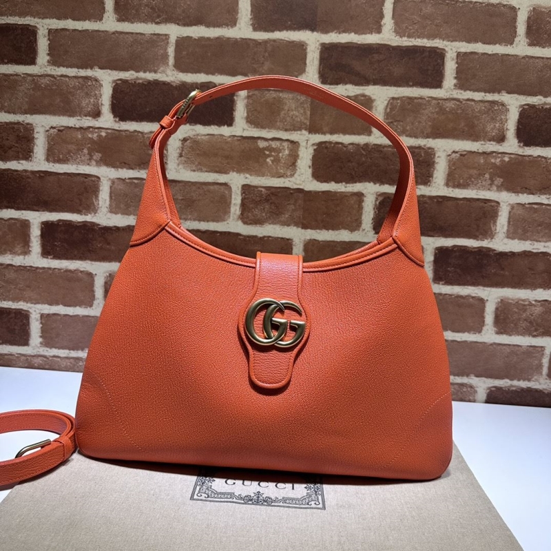 G*u*i top handle bags